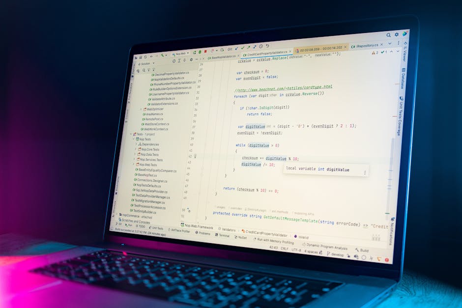 Close-up image of a computer screen displaying lines of HTML code with various tags, attributes, and image file links. The code features different colours for syntax highlighting, including red, green