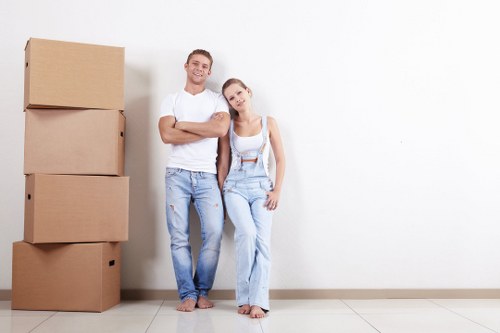 Professional packing services in Westminster with moving boxes and protective materials