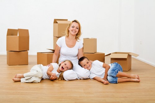 Careful packing of household items for a Westminster flat move